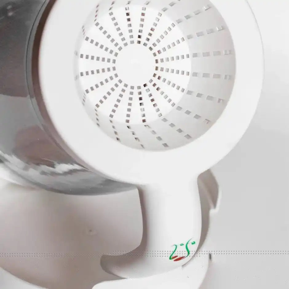 close-up of the Sprout Spout drainage lid and base showing the ventilated screen