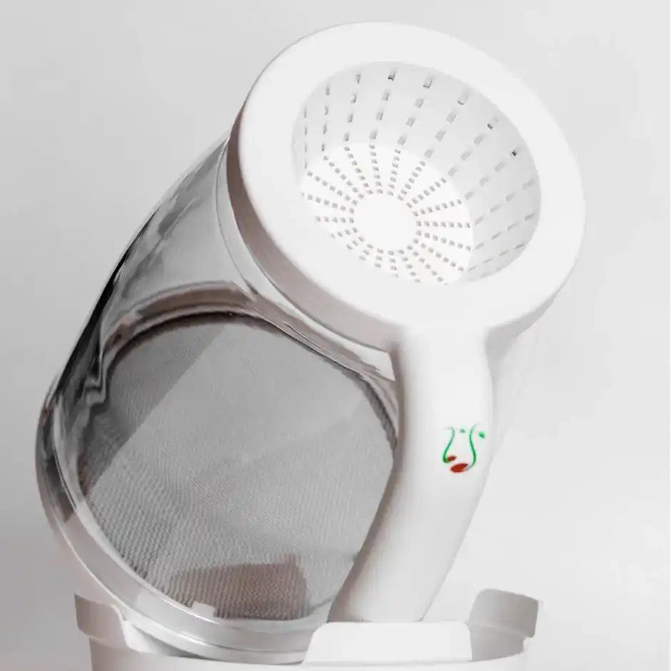close-up of the Sprout Spout drainage lid and base showing the ventilated screen