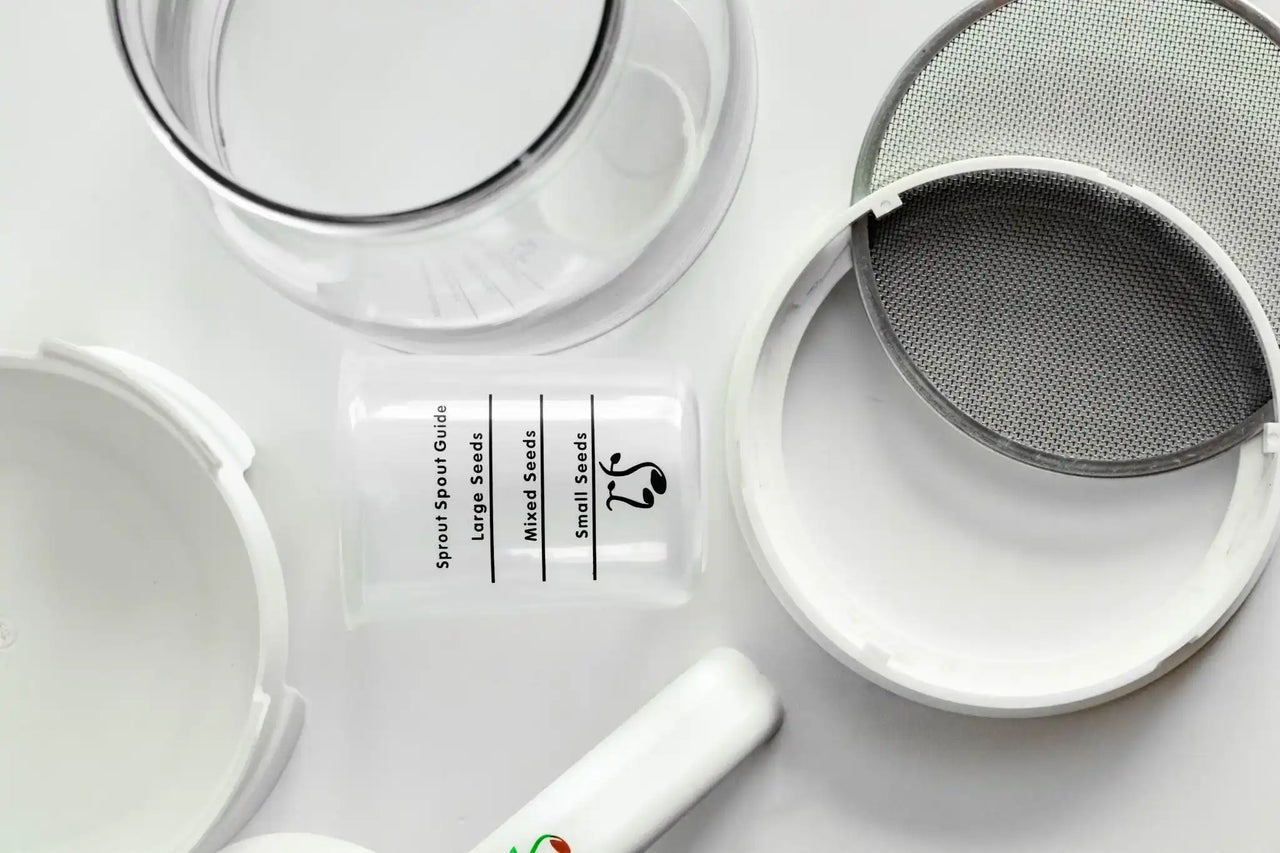 Sprout Spout components including jar, stainless steel mesh screens, and measuring cup for broccoli sprouts